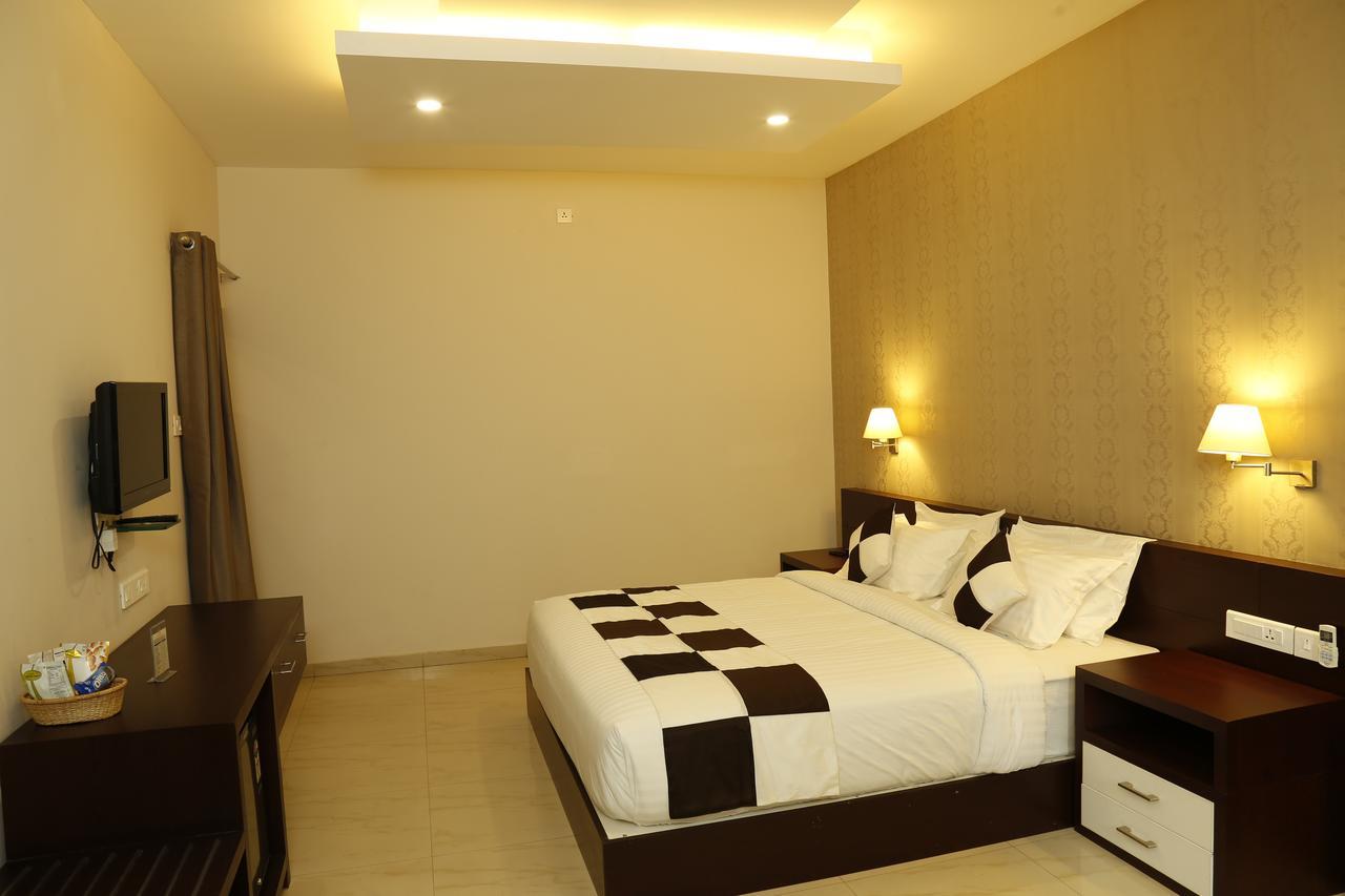 Rydges Inn Kottakkal Pokoj fotografie